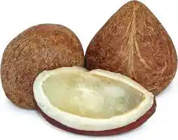 Loose dried coconut from ZabhiaNow, showing shredded coconut pieces in a clear container.