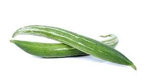 Fresh snake gourd from ZabhiaNow, showcasing its long, curved green vegetable with textured skin and smooth interior.