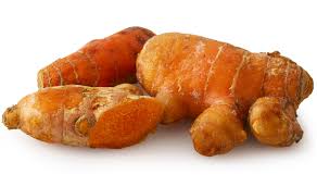 Fresh turmeric root from ZabhiaNow, showcasing vibrant orange-yellow turmeric rhizomes with rough brown skin and fresh, earthy appearance.